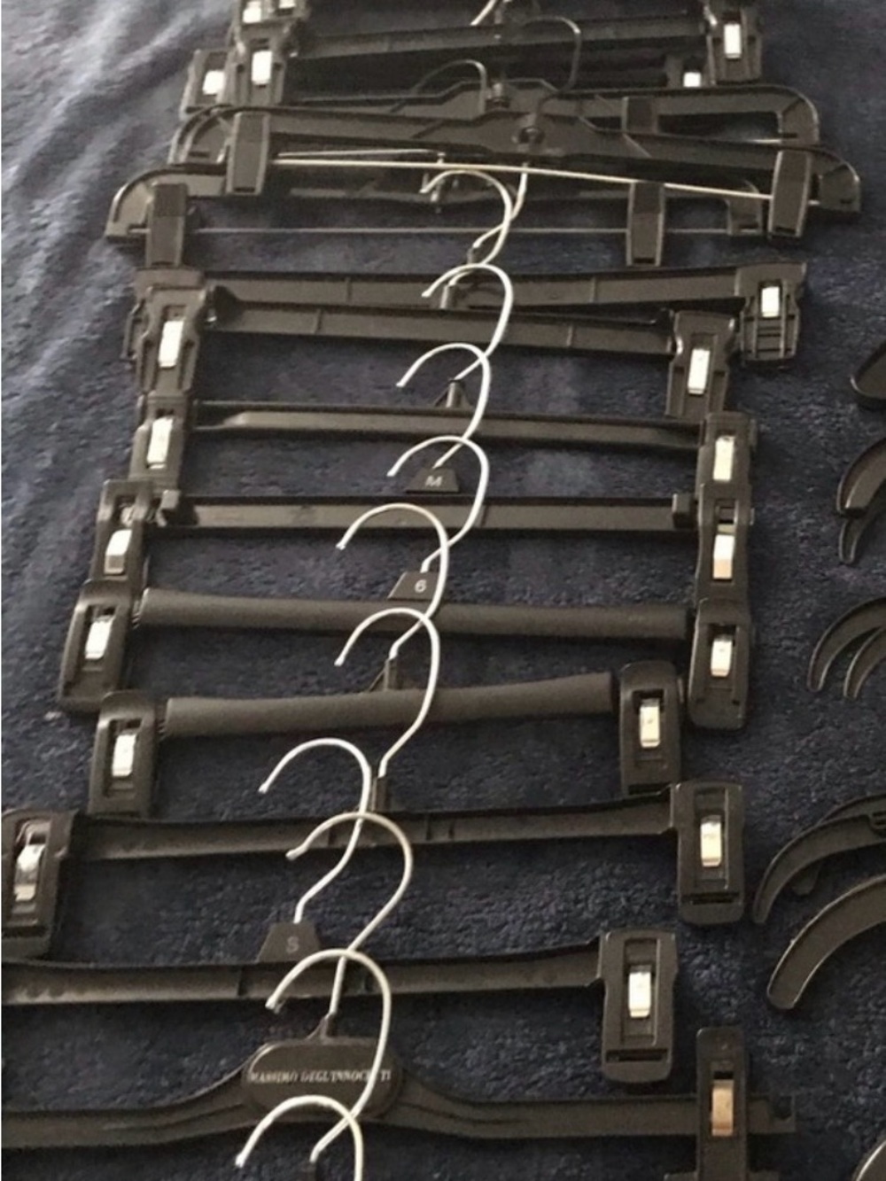 Special offer for marypavao only- 21 mixed (style and color) pant/skirt hangers.
